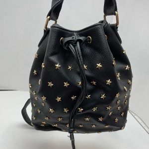 Cute faux leather cross body bag with gold stars